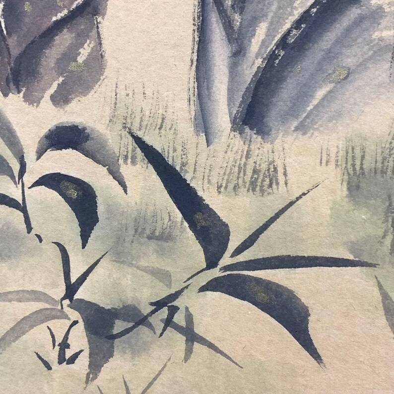 May include: Watercolor painting of bamboo leaves in shades of blue and gray, with touches of gold. The artwork features a close-up view of the leaves, showcasing their delicate details and textures. The background is a soft, neutral tone, enhancing the focus on the foliage.