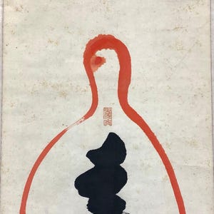 May include: Abstract artwork featuring a red outline and a black shape on a cream-colored background. The red outline resembles a bottle shape, with a small red stamp near the top. The black shape is a stylized form.