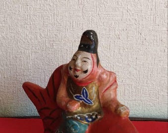 恵比寿人形（鯛に乗る） - 繁栄と幸運をもたらす縁起の良い神様の伝統