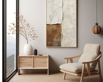 Op de afbeelding: Een beige fauteuil met houten poten staat in een kamer met een houten bijzettafel, een vaas met gedroogde takken en een ingelijst abstract schilderij met bruine en witte textuur.