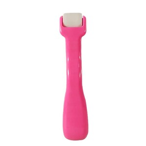May include: A bright pink handheld tool featuring a smooth, elongated handle and a cylindrical white roller head at the top. The device has a solid, opaque plastic construction with a rounded base and a uniform, vibrant magenta color throughout.