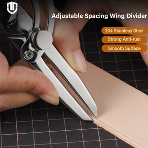 May include: A shiny, silver adjustable spacing wing divider tool made of 304 stainless steel. The tool is being used to measure a piece of light brown leather. The text on the image says "Strong Anti-rust" and "Smooth Surface".