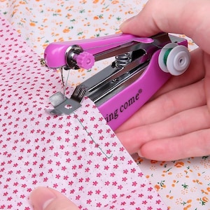 Mini Handheld Sewing Machine – Portable Manual Stitch Tool for Home, Travel & Outdoor Use – Small Hand Sewing Machine