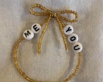 Taylor swift "A single thread of gold tied me to you" bracelet
