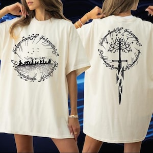 two white t-shirts with black designs on the back.