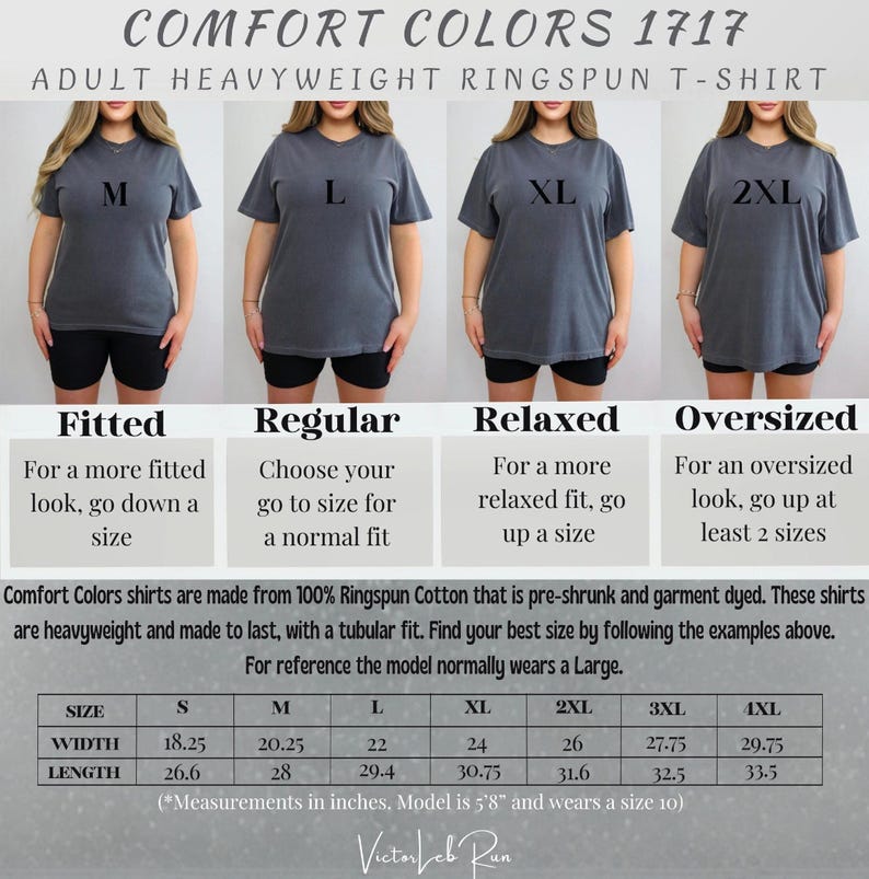 a woman wearing a gray shirt and black shorts
