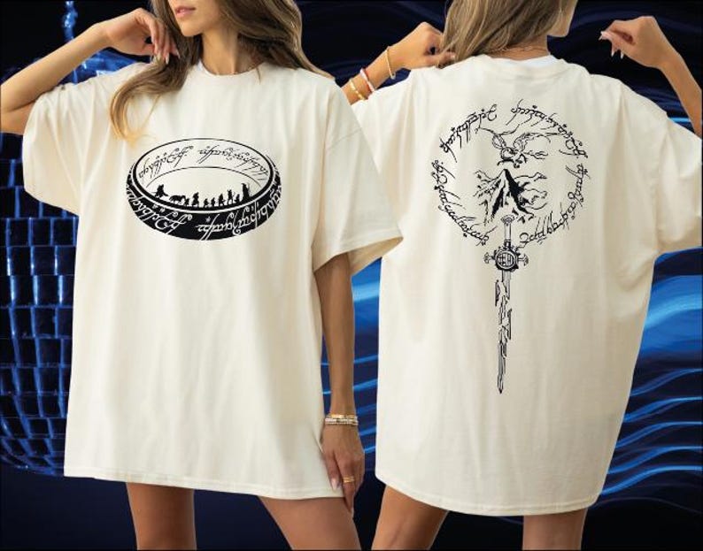 A woman wearing a white t-shirt with a graphic design on the front and back.