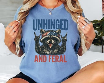 Unhinged and Feral Raccoon Comfort Colors T-Shirt, Cute Wild 4th of July Party Shirt, Funny American Animal Graphic Tee for Women VLB1125