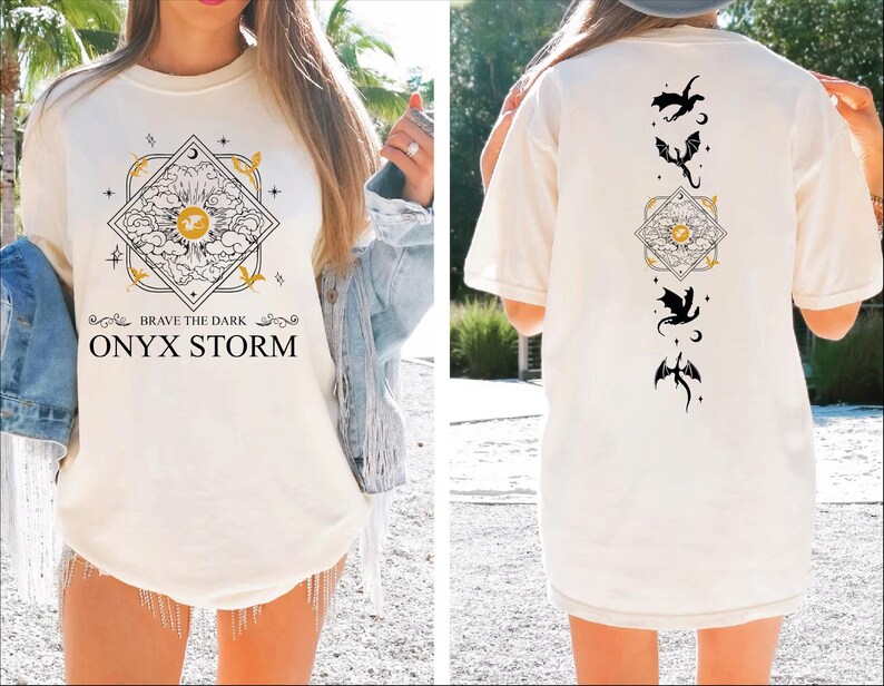 a woman wearing a t - shirt with the words onyx storm printed on it