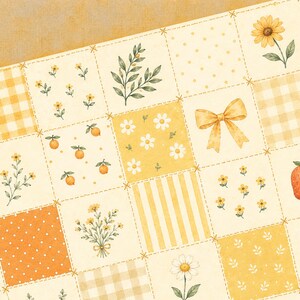 Peut inclure: Un motif de tissu compos&eacute; d'une grille de carr&eacute;s dans des tons de jaune, cr&egrave;me et orange. Les carr&eacute;s pr&eacute;sentent des illustrations de marguerites, tournesols, oranges, un n&oelig;ud, des rayures, des carreaux vichy, des pois et des brins de feuilles.