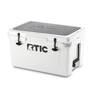 May include: A white cooler with a gray top and black accents. The cooler has the word "RTIC" in black on the front and the name "Stephanie" on the lid. It features black latches and a handle.