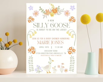 May include: A baby shower invitation with a floral border and a cartoon goose wearing a party hat. The text reads "A New Silly Goose is About to Be on the Loose!"  Join us for a baby shower honoring Marie Jones, April 10th, 11:30 AM, Crescent Bend, 2728 Kingston Pike Knoxville, TN. Registered at Target & Amazon.
