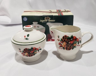 Vintage William James sugar and creamer set.  New in Box.  Christmas Design.