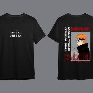 May include: Black t-shirt with a white graphic on the front that says "Evolution" in Japanese characters and a black and white graphic on the back of a character from the anime "Naruto" with the text "This world shall know PAIN".