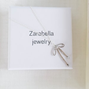 bow necklace, silver bow necklace on sterling silver chain, silver bow necklace, minimalist bow necklace, bridesmaid gift.