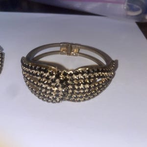 Vintage rhinestone clamper bracelet and clip on earrings