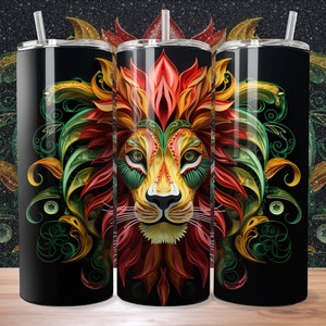 Puede incluir: Un vaso de acero inoxidable con un diseño de león colorido. La melena del león está hecha de papel rojo, amarillo y verde, y el fondo es negro.