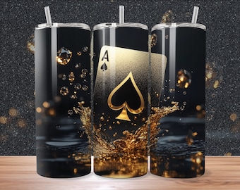 May include: Three black and gold stainless steel tumblers with a gold glitter background and a black ace of spades playing card graphic. The tumblers have a gold liquid splash effect.
