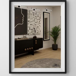 May include: Interior design with a black cabinet, wooden knobs, artwork, a mirror, and a potted plant. The artwork includes a black and white abstract design and a profile silhouette. The room has a modern aesthetic.