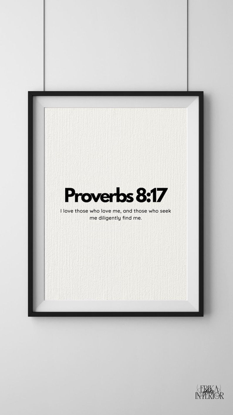 May include: A framed print featuring the text "Proverbs 8:17" in a bold black font. The quote "I love those who love me, and those who seek me diligently find me" is below. The background is off-white with a textured finish.