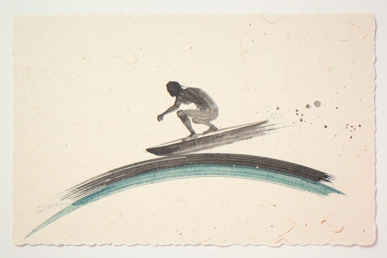 Sumi-e Surfer Cutback with Aqua Accent Print framed in a coastal dining room setting