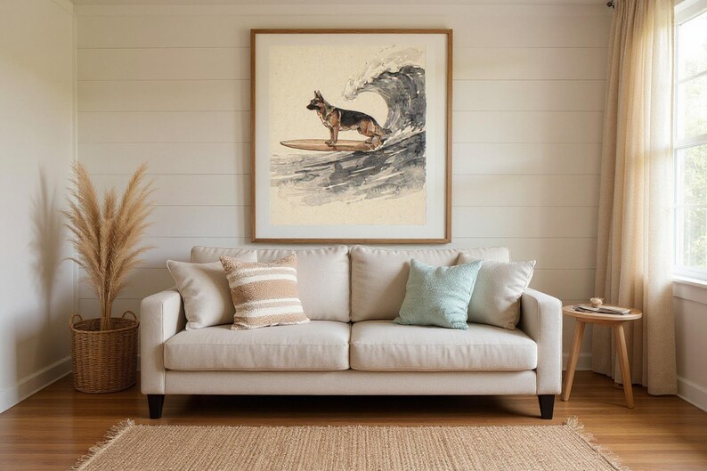 German Shepherd Surfing Print framed in a beach-style living room setting