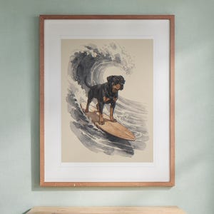 Rottweiler Surfing print in a Red Oak frame with a white mat, hanging above the desk in a kids' room.