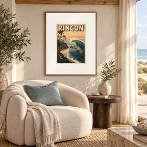 Rincon Surf print in a Red Oak frame with a white mat in a light-filled coastal sitting room.