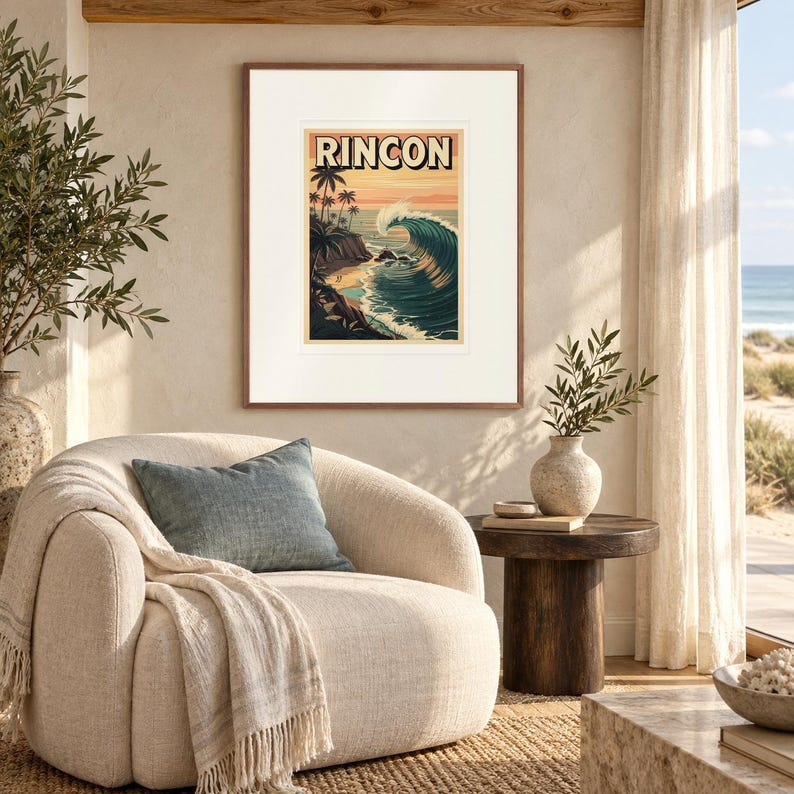 Rincon Surf print in a Red Oak frame with a white mat in a light-filled coastal sitting room.