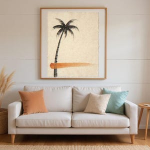 Sumi-e Lone Palm with Sunset Accent Print framed in a beach-style living room setting