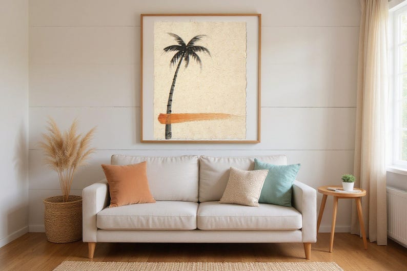 Sumi-e Lone Palm with Sunset Accent Print framed in a beach-style living room setting