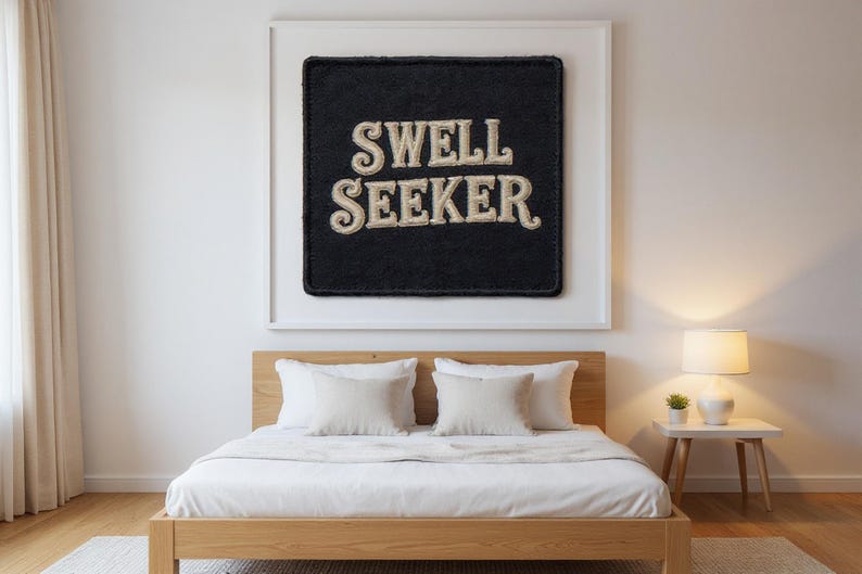 Swell Seeker Embroidered Patch Print framed in a modern bedroom setting
