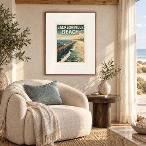 Jacksonville Beach Surf print in a Red Oak frame with a white mat in a light-filled coastal sitting room.