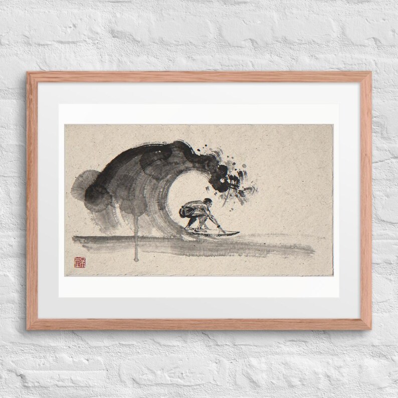 Surfer in the Barrel Xieyi Ink print in a Red Oak 24 by 18 inch frame with a white mat on a white brick wall.