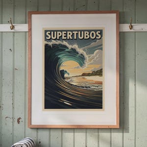 Supertubos Surf Travel Poster print in a Red Oak frame with a white mat, hanging above the bench in a beach cottage entryway.