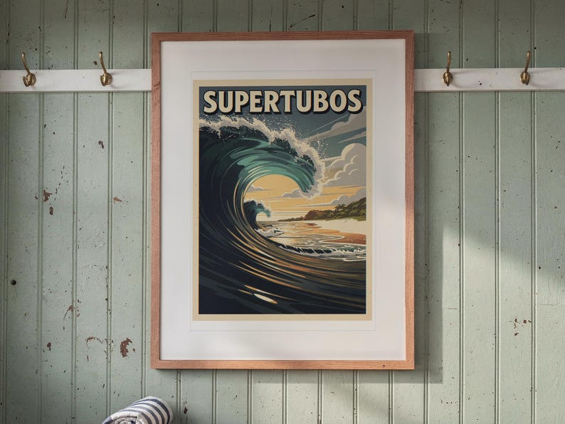 Supertubos Surf Travel Poster print in a Red Oak frame with a white mat, hanging above the bench in a beach cottage entryway.