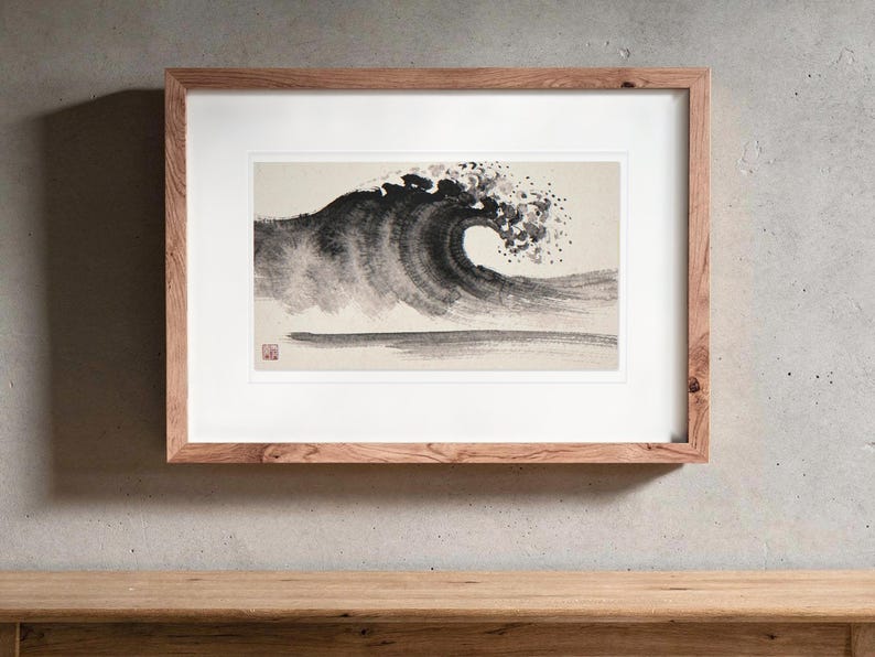 Crashing Wave Xieyi Ink print in a Red Oak frame with a white mat, hanging above the console in a japandi living room.