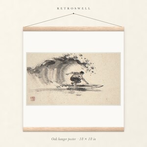 Surfer Cutback Xieyi Ink oak hanger poster, 18 by 18 inches, the painting centred on the paper with natural wood rails and a hanging cord.