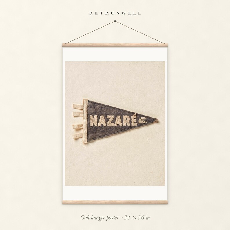 Nazaré Surf Pennant oak hanger poster, 24 by 36 inches, with natural wood rails and a hanging cord.