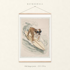 Bulldog Surfing oak hanger poster, 24 by 36 inches, with natural wood rails and a hanging cord.