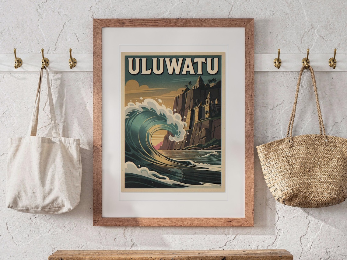 Uluwatu Bali Surf Travel Poster print in a Red Oak frame with a white mat, hanging above the bench in a beach cottage entryway.