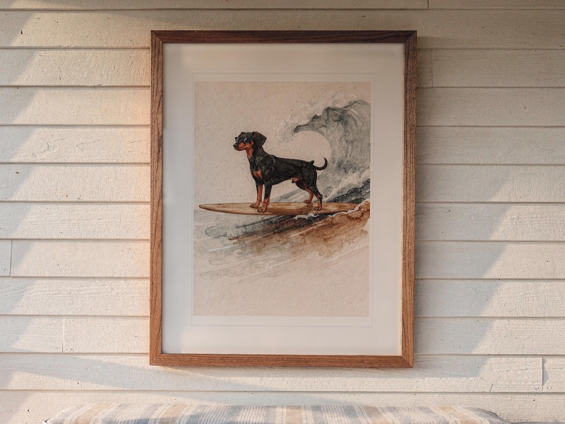 Doberman Surfing print in a Red Oak frame with a white mat, hanging above the bench in a screened beach porch.