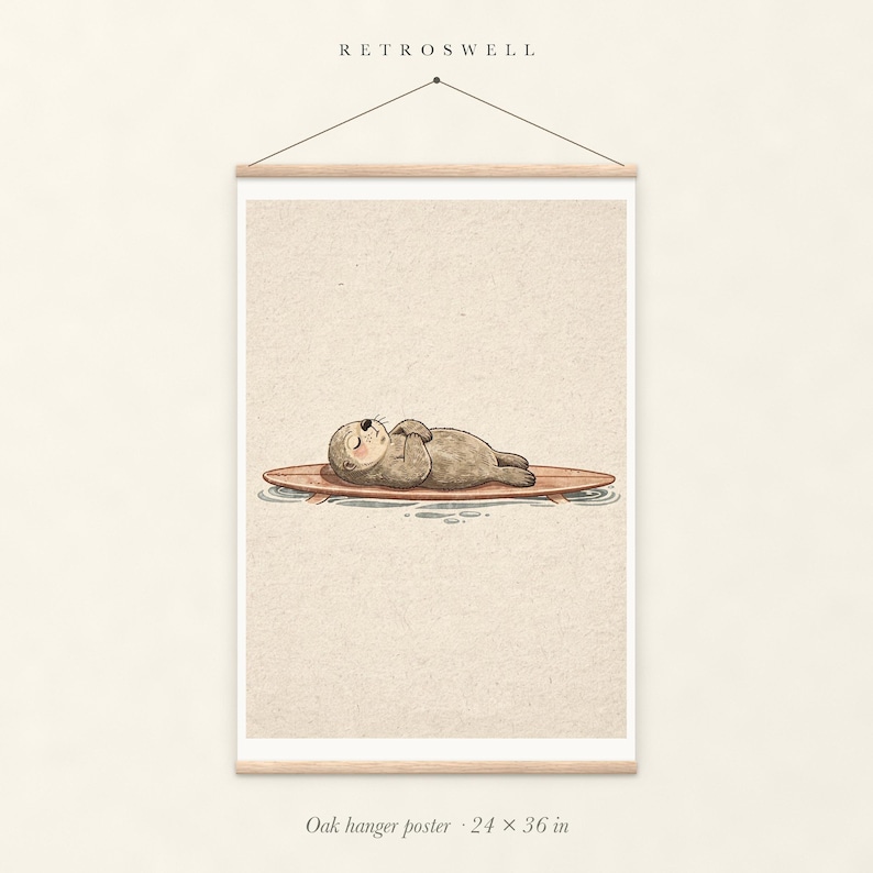 Sea Otter on Surfboard oak hanger poster, 24 by 36 inches, with natural wood rails and a hanging cord.