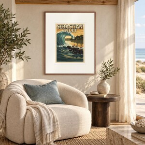 Sebastian Inlet Surf print in a Red Oak frame with a white mat in a light-filled coastal sitting room.