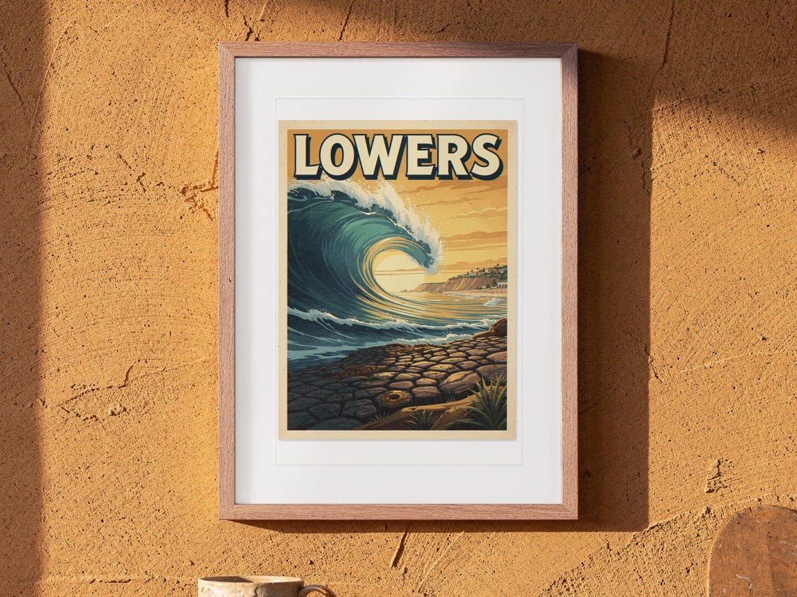 Lowers Trestles Surf Travel Poster print in a Red Oak frame with a white mat, hanging above the table in a boho living room.