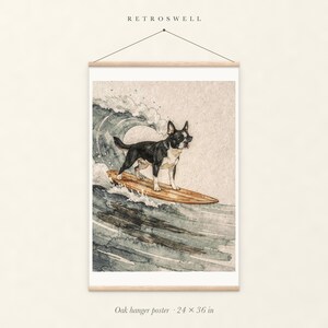 Boston Terrier Surfing oak hanger poster, 24 by 36 inches, with natural wood rails and a hanging cord.