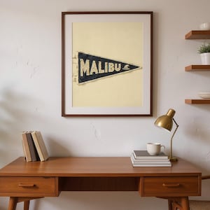 Malibu Vintage Surf Pennant Print framed in a home office setting