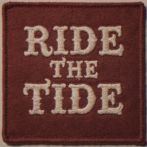 Ride the Tide embroidered-style patch unframed printed artwork and full composition with its paper border.