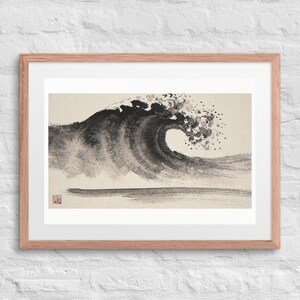 Crashing Wave Xieyi Ink print in a Red Oak 24 by 18 inch frame with a white mat on a white brick wall.