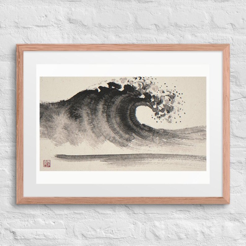 Crashing Wave Xieyi Ink print in a Red Oak 24 by 18 inch frame with a white mat on a white brick wall.